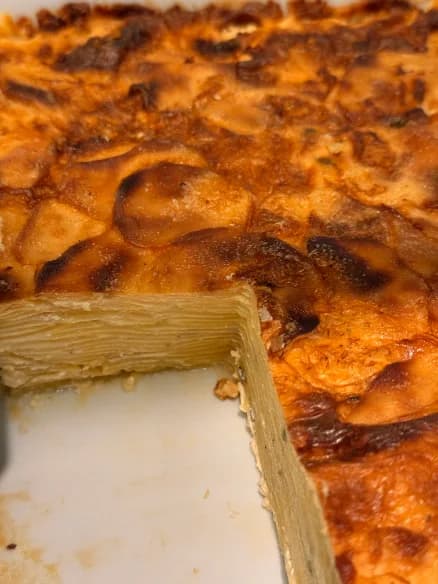 Layered potato bake cut into portions