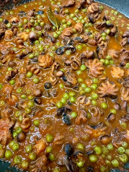 Meat stew with peas and mushrooms