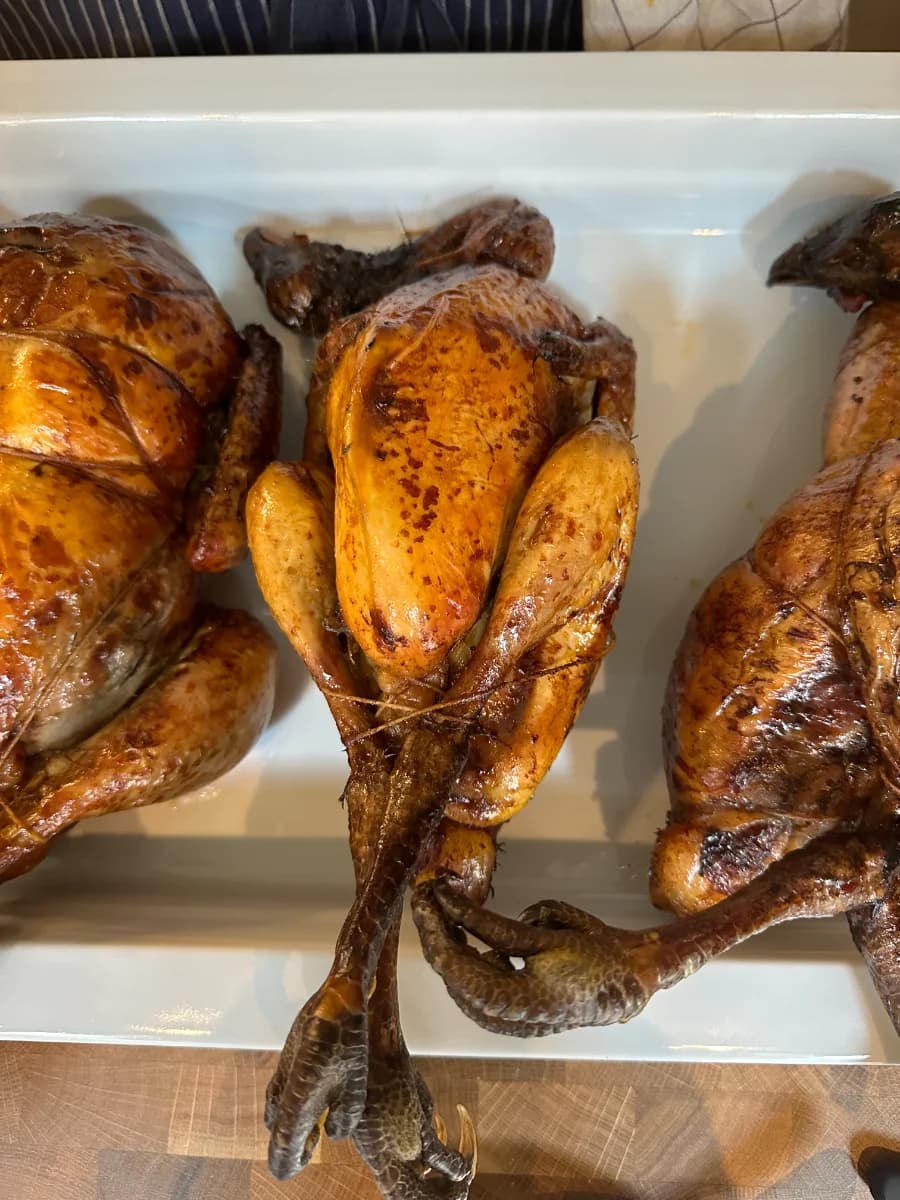 Spit-roasted chickens