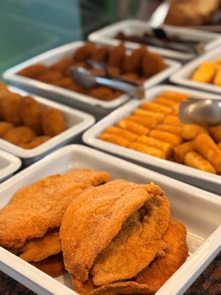 Trays of fried croquettes and cutlets